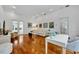 Bright living room featuring hardwood floors, neutral colors, and natural light at 335 Beloit Ave, Winter Park, FL 32789