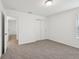 Bright bedroom with plush carpeting and a sliding door closet at 3845 Giorgio Dr, Winter Haven, FL 33884