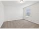 Bedroom with neutral carpet and a window at 3845 Giorgio Dr, Winter Haven, FL 33884