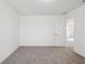 Neutral bedroom with plush carpeting and a bright interior design at 3845 Giorgio Dr, Winter Haven, FL 33884