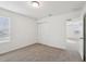 Carpeted bedroom with closet and natural light at 3845 Giorgio Dr, Winter Haven, FL 33884