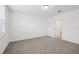 Bright, carpeted bedroom featuring neutral colors and ample natural light, ready for personalization at 3845 Giorgio Dr, Winter Haven, FL 33884