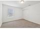 Bedroom with neutral carpet, closet and natural light at 3845 Giorgio Dr, Winter Haven, FL 33884