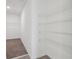 Spacious walk-in closet with wire shelving, offering ample storage and organization solutions for wardrobe and accessories at 3845 Giorgio Dr, Winter Haven, FL 33884
