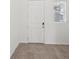 Bright entryway featuring neutral tile floors and a white front door allowing plenty of natural light at 3845 Giorgio Dr, Winter Haven, FL 33884