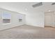 Bright loft area features neutral carpet, white walls, windows and closet for ample storage at 3845 Giorgio Dr, Winter Haven, FL 33884