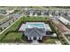 Aerial view of the community pool with nearby homes at 4057 Sagefield Dr, Harmony, FL 34773