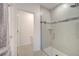 This walk-in shower features glass doors, decorative tile, and updated fixtures at 4057 Sagefield Dr, Harmony, FL 34773