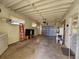 The spacious garage has a metal door, storage, and room for parking at 420 W Crystal Dr, Sanford, FL 32773