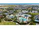 A waterpark is surrounded by an abundance of trees in a vast community at 431 Novi Path, Kissimmee, FL 34747