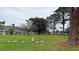 Lush green community area with birds at 4448 Pinebark Ave # 56-1, Orlando, FL 32811