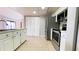 Well-lit kitchen with stainless steel appliances and ample counter space at 4448 Pinebark Ave # 56-1, Orlando, FL 32811