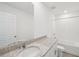 Bathroom featuring a granite vanity, large mirror, and a bathtub-shower at 4965 Kaia Ave, Winter Haven, FL 33884