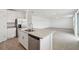 Open kitchen featuring granite counters, stainless steel appliances and lots of cabinet space at 4965 Kaia Ave, Winter Haven, FL 33884