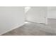Tiled room featuring bright natural light and an adjacent door at 4965 Kaia Ave, Winter Haven, FL 33884