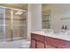 This full bathroom is equipped with a shower and tub combo plus a sink with modern fixtures at 5080 Longmeadow Park St, Orlando, FL 32811