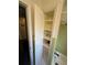 Linen closet in bathroom features shelving for storage at 635 Kittredge Dr, Orlando, FL 32805