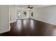The spacious main bedroom has hardwood floors, ample natural light, and access to a bathroom at 662 Lake Dr, Altamonte Springs, FL 32701