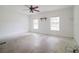 Unfinished basement with two windows provides natural light at 6801 County Rd 665, Bushnell, FL 33513