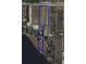 Aerial view of the lot outlined in blue with lake access at 9130 Laws Rd, Clermont, FL 34714