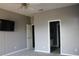 Spacious bedroom with neutral walls and access to other rooms at 9130 Laws Rd, Clermont, FL 34714