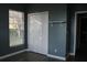 Bedroom featuring hardwood floors, paint in neutral gray, closet, and window with blinds at 9130 Laws Rd, Clermont, FL 34714