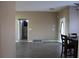 Inviting living space with neutral tones and tile floors, ideal for comfortable living and entertaining at 9130 Laws Rd, Clermont, FL 34714