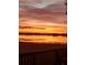 Beautiful sunset over the lake at 9130 Laws Rd, Clermont, FL 34714