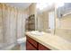 View of a bathroom featuring shower with curtain and vanity at 9236 Baton Rouge Dr, Orlando, FL 32818