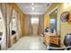 Sunroom featuring tile flooring, large windows, and comfortable seating with a view to the outside at 9236 Baton Rouge Dr, Orlando, FL 32818