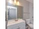 Bathroom with a vanity, sink, lighting and a commode at 1015 S Hiawassee Rd # 3514, Orlando, FL 32835