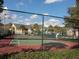 Well-maintained tennis court with a new net and fenced perimeter at 1015 S Hiawassee Rd # 3514, Orlando, FL 32835