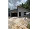 This in-progress home shows the garage door and front door and the beginning stages of this house at 1017 Randall St, Orlando, FL 32805