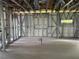 This in-progress home features metal framework walls and insulation with plumbing and electrical in the interior at 1017 Randall St, Orlando, FL 32805
