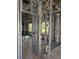 This in-progress home features metal framework walls on the interior with plumbing and electrical at 1017 Randall St, Orlando, FL 32805