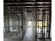 Interior framing of a new home under construction, revealing the structure and layout at 1017 Randall St, Orlando, FL 32805