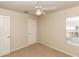 Bedroom with neutral carpet, white trim and a ceiling fan at 1201 Berkman Cir, Sanford, FL 32771