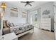 Bedroom featuring lots of natural light, decorative trim, and an exterior door at 1220 Lake Mills Rd, Chuluota, FL 32766