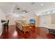 Living room with hardwood floors, neutral paint, and a ceiling fan at 1220 Lake Mills Rd, Chuluota, FL 32766