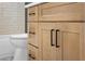 Close-up of bathroom vanity featuring a light-colored wood cabinet at 137 Stevens Ave, Chuluota, FL 32766