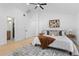 Bright main bedroom featuring a vaulted ceiling and a view into the main bathroom at 137 Stevens Ave, Chuluota, FL 32766