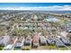 Aerial view of the neighborhood with pond and community amenities at 15323 Torpoint Rd, Winter Garden, FL 34787