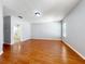 Large bedroom with hardwood floors and light gray walls at 15323 Torpoint Rd, Winter Garden, FL 34787