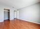 Bedroom featuring hardwood floors and a walk-in closet at 15323 Torpoint Rd, Winter Garden, FL 34787