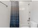 Bathroom with a combination shower and tub, complete with stylish curtain at 17846 Adrift Rd, Winter Garden, FL 34787