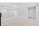 Spacious bonus room with neutral paint, carpet flooring, and natural light at 17846 Adrift Rd, Winter Garden, FL 34787