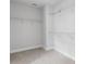 Empty walk-in closet with wire shelving and neutral carpeting at 17846 Adrift Rd, Winter Garden, FL 34787