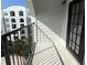 View of the balcony with black railings and a black door, offering a spot for outdoor relaxation at 202 E South St # 5037, Orlando, FL 32801