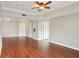 Bright living room with wood floors and neutral paint ready for your personal touch at 202 E South St # 5037, Orlando, FL 32801