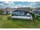 Aerial view of a home with a screened in pool and an expansive yard at 2157 Bay Line Rd, Oakland, FL 34787